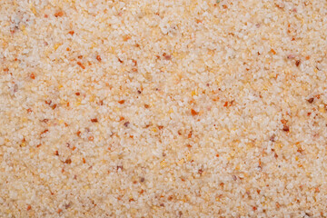 textural plaster of the house wall, colored granite chips, background