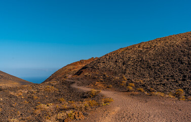 Trail reaching the Crater of the Teneguia volcano from the route of the volcanoes, La Palma island, Canary Islands. Spain