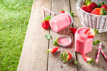 Strawberry milkshake in bottles