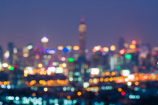 Blurred night downtown city, building background with light bokeh scene.blur backgrounds concept