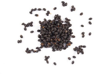 Black papaya seeds on white background, dry