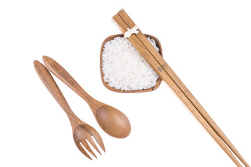 Natural Wooden fork, spoon and chopsticks with rice in small wooden bowl on white background, Kitchenware concept