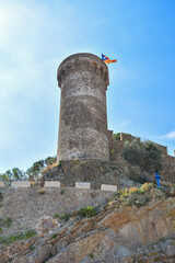 Tossa de Mar castle tower photographed from below.