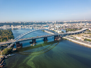 Aerial drone view. A cable-stayed bridge under construction across the Dnieper River in Kiev.