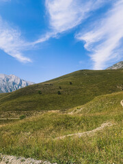 Fields in the mountains, natural colors, mountains background