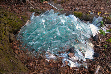 A pile of broken glass. Environmental pollution, global problems.