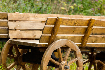 in the summer in the village an old wooden cart