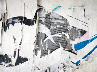 Old grunge ripped, torn vintage posters creased crumpled paper surface texture background