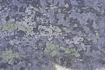 Background. Iron surface with remnants of old lilac paint, chipped paint, texture background.