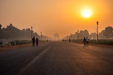 Silhouette of triumphal arch architectural style war memorial during hazy morning. Pollution level...