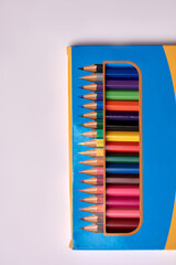 colored pencils packaged on a white background
