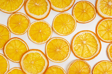 Dried orange slices close-up on the white background,