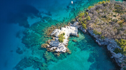Naklejka na ściany i meble Aerial drone photo of tropical exotic bay with turquoise rocky seascape in Caribbean destination island