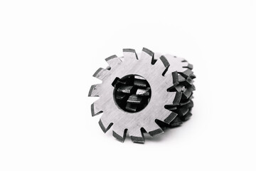 Several metal milling disc cutters for industrial equipment. The tool is isolated on a white...