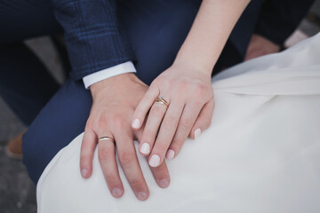 hands with wedding rings