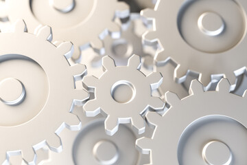 Different metallic gears fitting into each other on several layers; metaphor for together strong,...