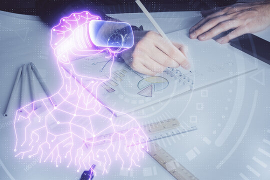 Abstract man wearing augmented reality headsets computer work with writing human background. AR concept. Double exposure.