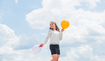 Air balloons for party. Cheerful girl have fun. Summer holidays and vacation. Childhood happiness. Joyful teen celebrate. Play with air. Happiness is simple. Happiness concept. Freedom concept