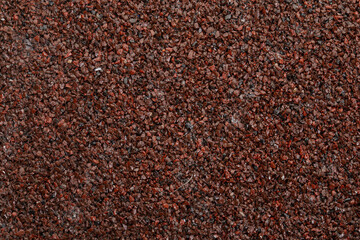 textural plaster of the house wall, colored granite chips, background