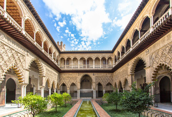 Fototapeta na wymiar Patio de las Doncellas in Royal palace of Seville, Spain
