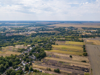 Fototapeta premium Agricultural village in Ukraine. Aerial drone view.