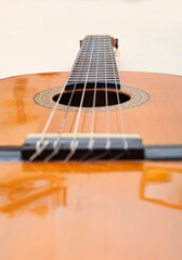 Obraz premium View of a guitar and its strings.