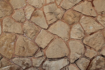 Stone wall texture, masonry, close up, copy space.