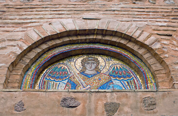 Fototapeta na wymiar Tympanum with ancient mosaic of Collegiate Church of Saint Michael in Vydubychi Monastery in Kiev, Ukraine