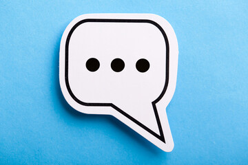 Chat Speech Bubble Isolated On Blue Background