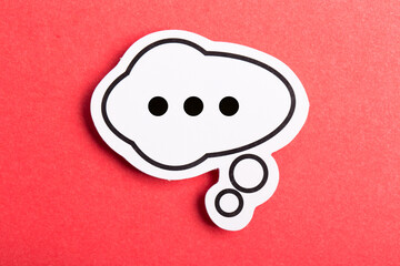 Chat Speech Bubble Isolated On Red Background