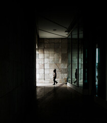  Child walking with a modern arquitecture background - Ciudad de la Cultura, Santiago de Compostela, Spain