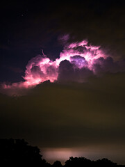 Clouds illuminated by lightning