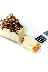 Portion of delicious chocolate cake on white background
