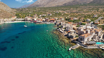 Aerial drone photo of picturesque fishing village of Gerolimenas with crystal clear emerald sea and traditional Lakonian architecture, Mani peninsula, Peloponnese, Greece