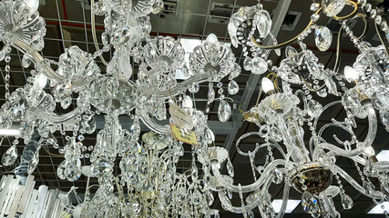 Electric lamps and lamps suspended from the ceiling in the store. Minsk Belarus 09 September 2020