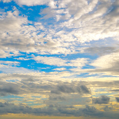 Blue beautiful sky and cumulus clouds.
