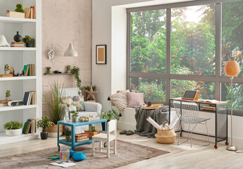 Modern decorative living room corner and city view, child object interior style. Work table and laptop.