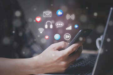 businessman using a social media marketing concept on mobile phone with notification icons.