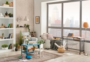 Modern decorative living room corner and city view, child object interior style. Work table and laptop.