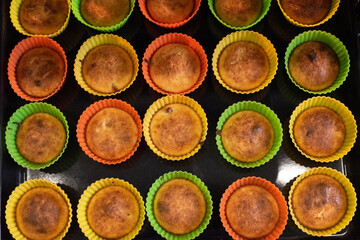 Baking cupcakes in the oven. Home cooking