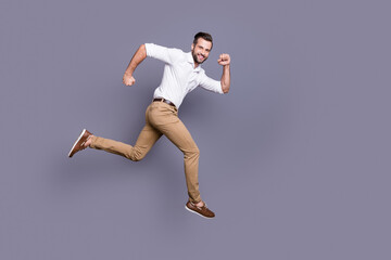 Full length body size view of his he nice attractive content cheerful cheery man jumping running...