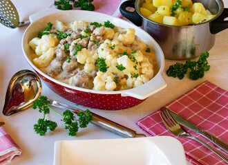 casserole with cauliflower, meat and sauce