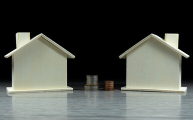 Piggy bank, house and coin pile For real estate projects (The concept of saving money And real estate)