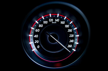 More than 260 Kilometers per hour,light with car mileage with black background,number of speed,Odometer of car.