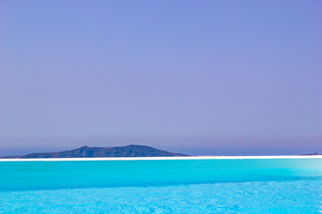Fototapeta na wymiar Luxurious swimming pool in Santorini Greece