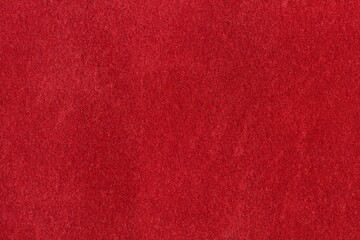 Red textured paper. Holiday red, merry christmas background.