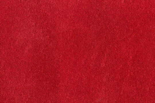Red textured paper. Holiday red, merry christmas background.