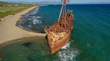 Aerial drone photo of famous shipwreck of Agios Dimitrios abandoned in Selinitsa bay near Gythion...