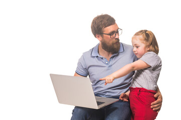 Little girl and her father with a laptop on a white background, isolate