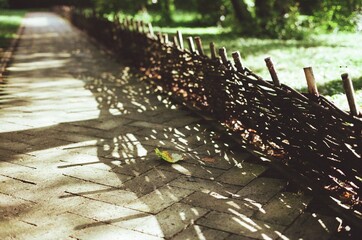 Wicker fence in the garden.